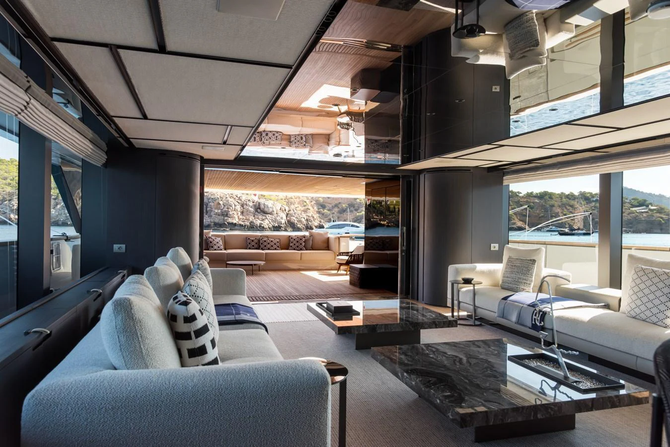 The yacht's salon features luxurious seating with panoramic views and modern decor. aboard AV1 Yacht for Sale