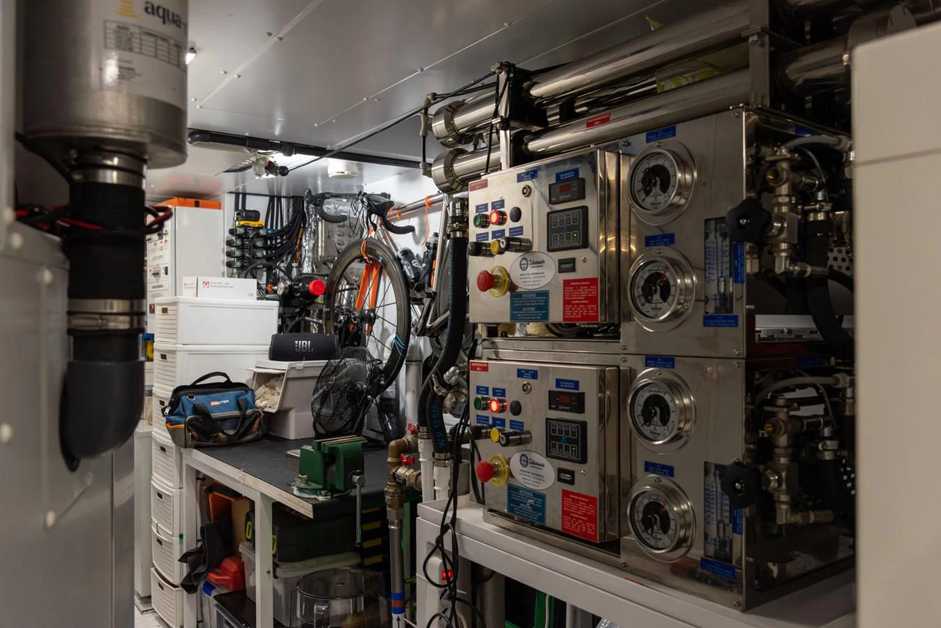The image shows the yacht's engine room with various machinery and equipment. aboard AV1 Yacht for Sale