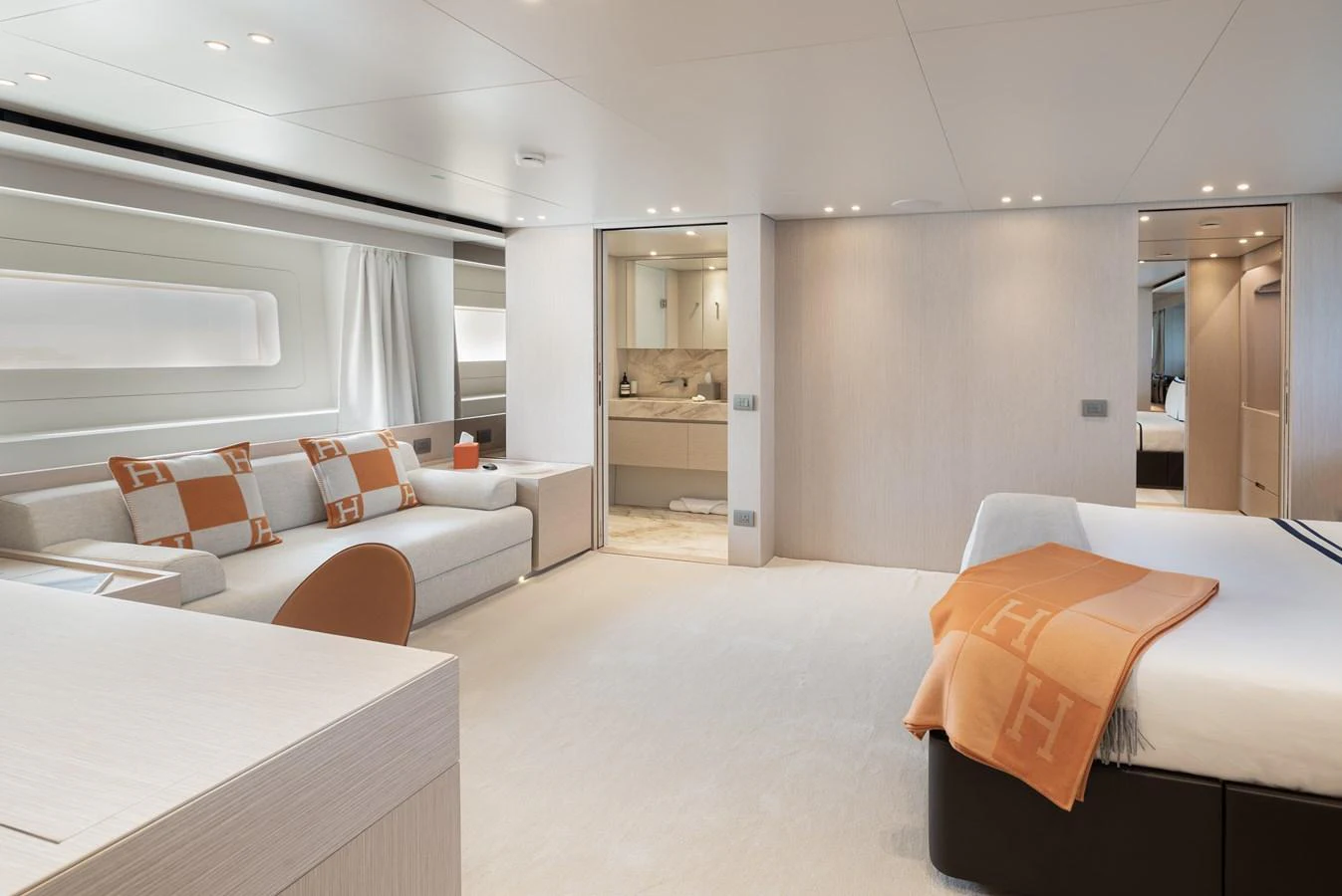The master stateroom features a spacious layout with luxurious furnishings and a serene ambiance. aboard LET IT BE Yacht for Sale