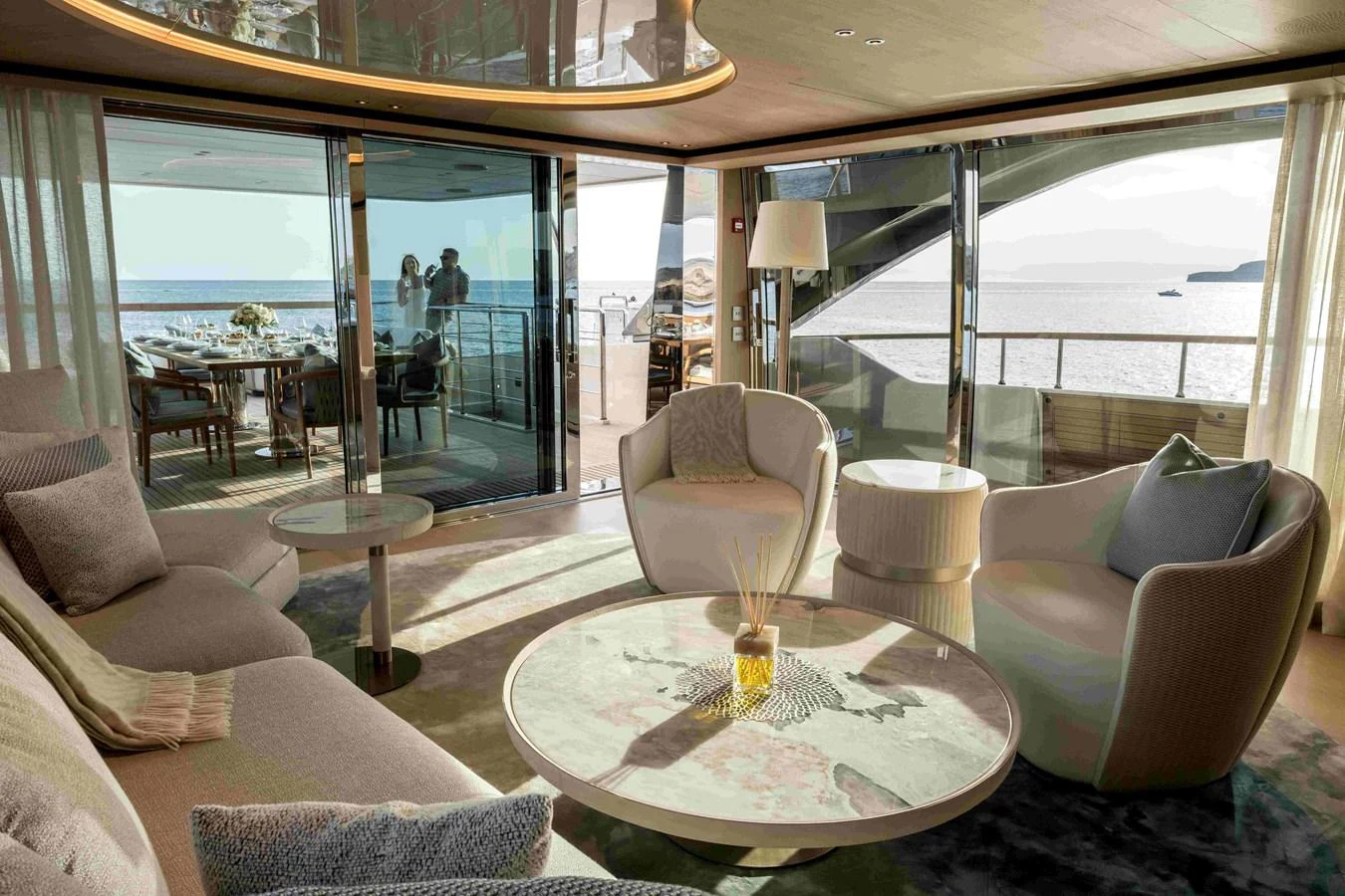 The salon offers a luxurious and comfortable space with panoramic views of the sea. aboard UNIQUE S Yacht for Sale