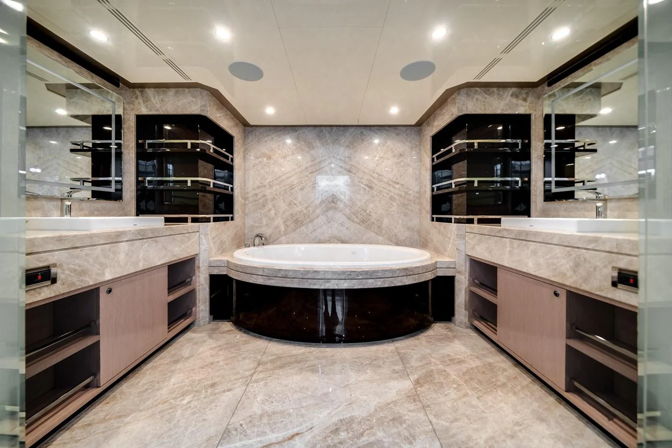 This luxurious yacht bathroom features a spacious layout with elegant marble finishes and modern fixtures. aboard OCEAN ALEXANDER 37L Yacht for Sale