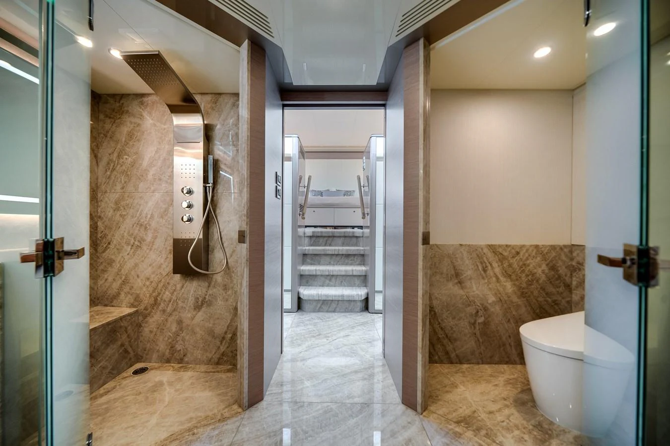 The yacht's interior features a luxurious bathroom with marble finishes and modern fixtures. aboard OCEAN ALEXANDER 37L Yacht for Sale