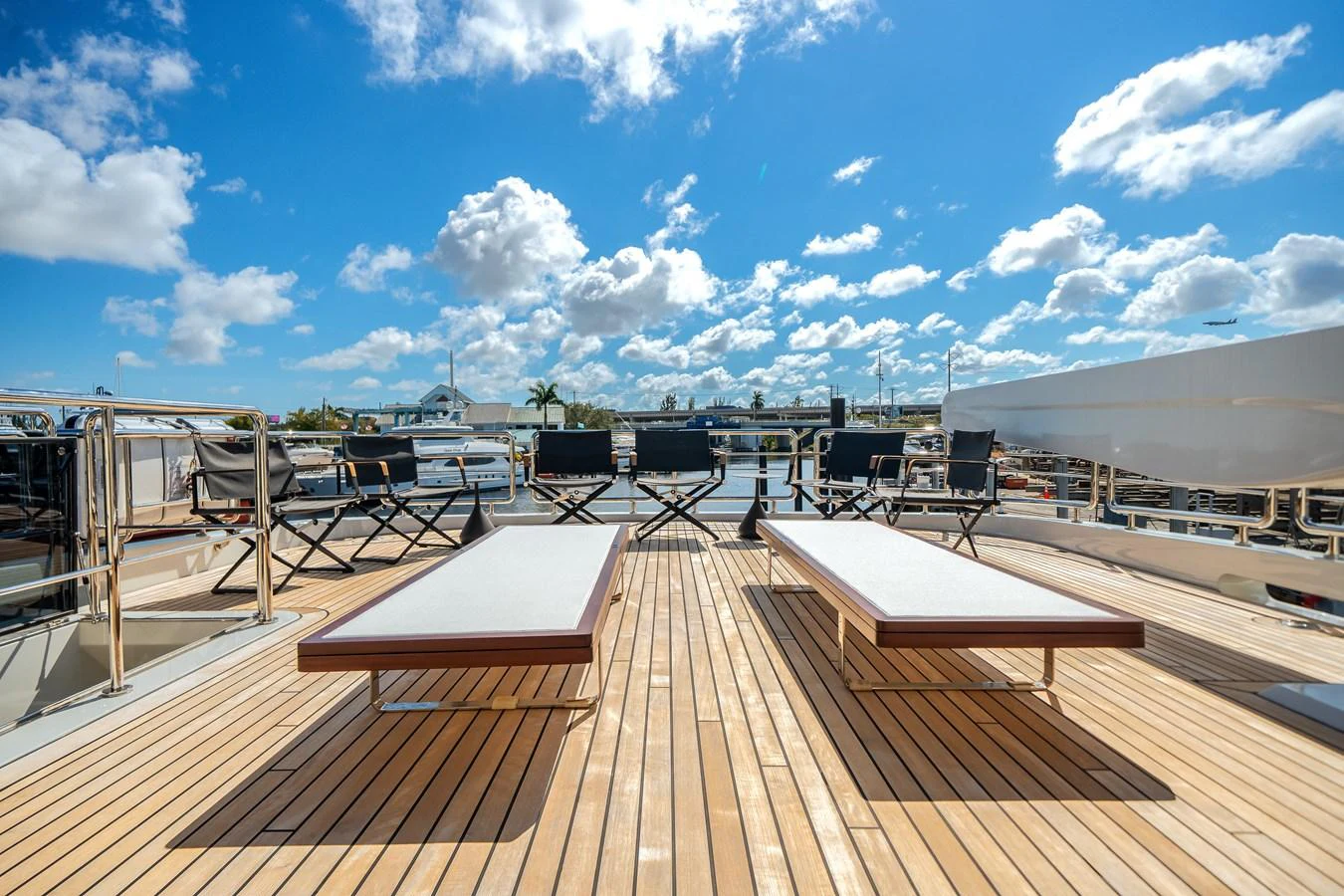 The sundeck offers a spacious area with sun loungers and seating, perfect for relaxation under the open sky. aboard OCEAN ALEXANDER 37L Yacht for Sale