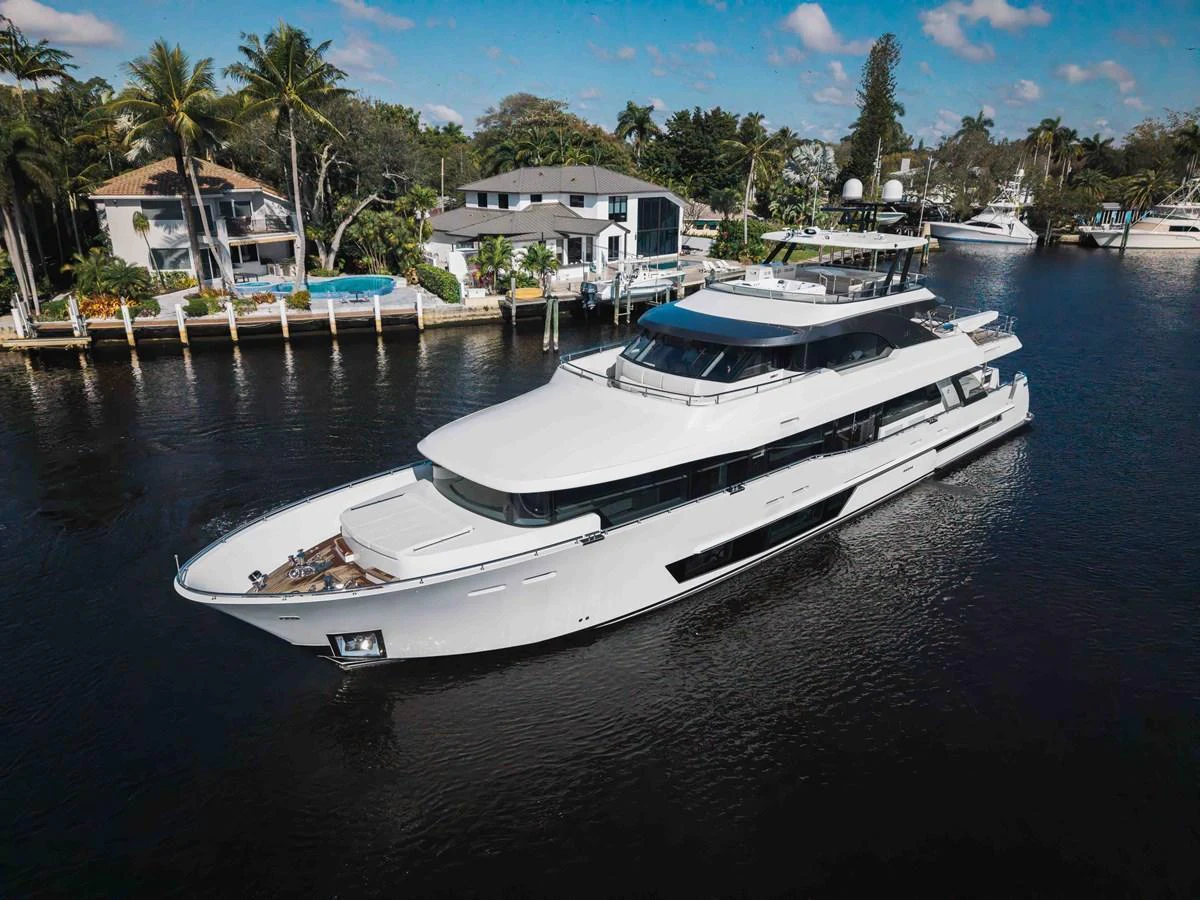 A sleek and modern yacht cruises through a serene waterway, showcasing its elegant design and spacious decks. aboard OCEAN ALEXANDER 37L Yacht for Sale