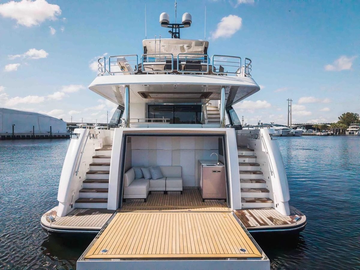 The yacht's aft deck features a spacious lounging area with a view of the water. aboard OCEAN ALEXANDER 37L Yacht for Sale
