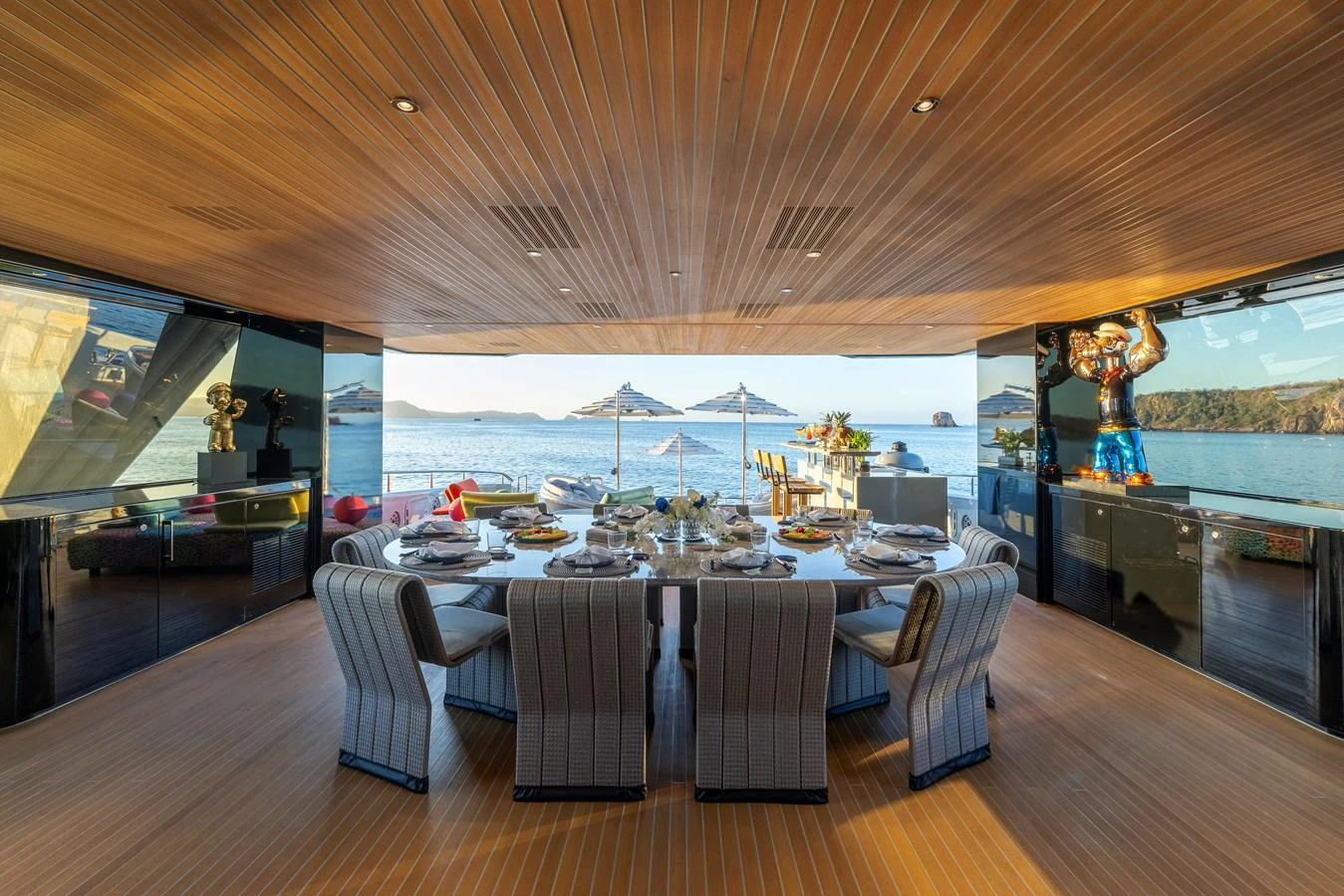 A luxurious dining area with a stunning ocean view, perfect for elegant meals on the water. aboard SPRITZ 116 Yacht for Sale