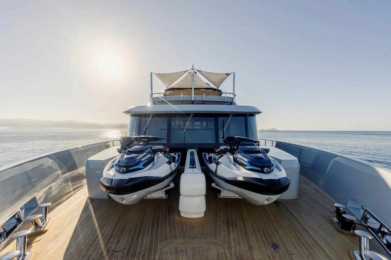The foredeck features two jet skis and ample space for relaxation and activities. aboard SPRITZ 116 Yacht for Sale