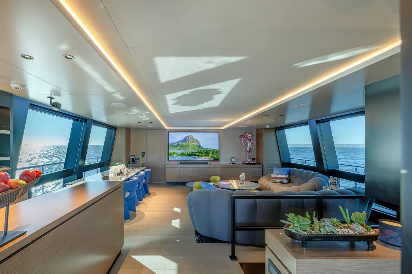 The salon offers a spacious and modern living area with panoramic views and luxurious furnishings. aboard SPRITZ 116 Yacht for Sale