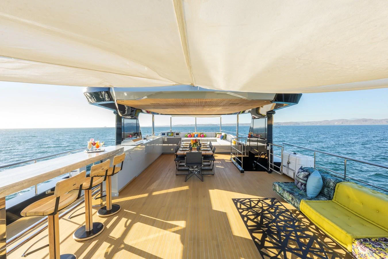 The sundeck offers a spacious and luxurious area for relaxation and dining with panoramic sea views. aboard SPRITZ 116 Yacht for Sale