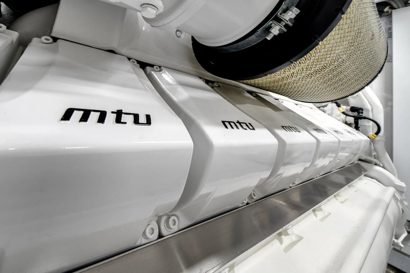 A close-up view of the yacht's powerful and pristine engine components. aboard OCEAN ALEXANDER 44G/01 Yacht for Sale