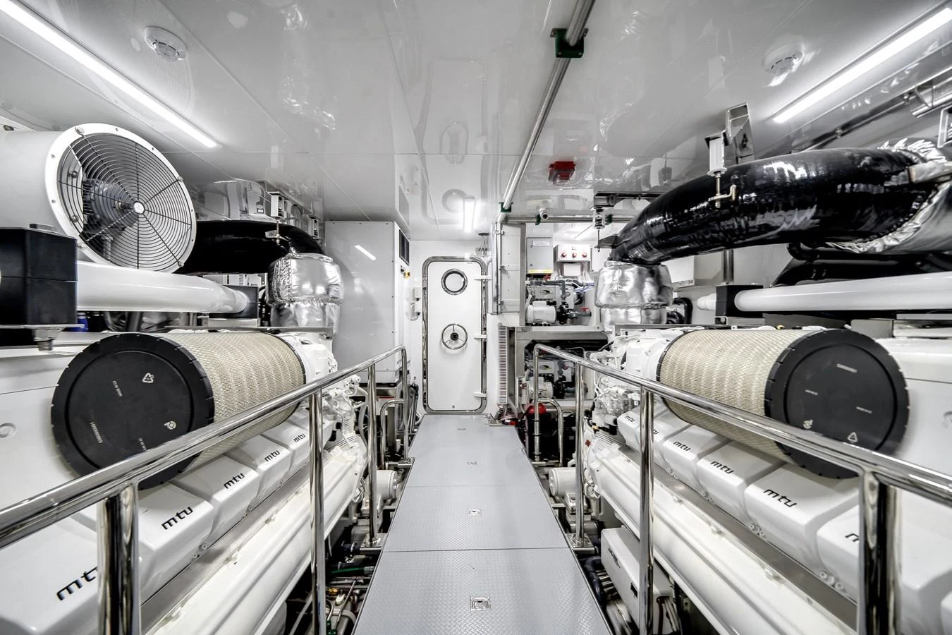 The engine room showcases the yacht's powerful and meticulously maintained machinery. aboard OCEAN ALEXANDER 44G/01 Yacht for Sale