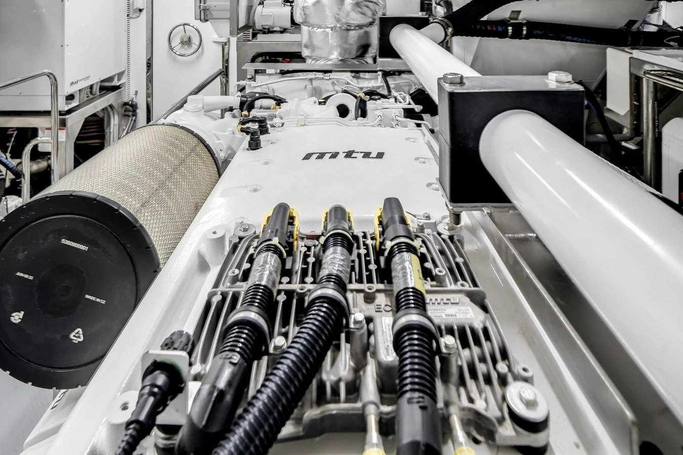 A pristine engine room showcasing advanced machinery and equipment. aboard OCEAN ALEXANDER 44G/01 Yacht for Sale