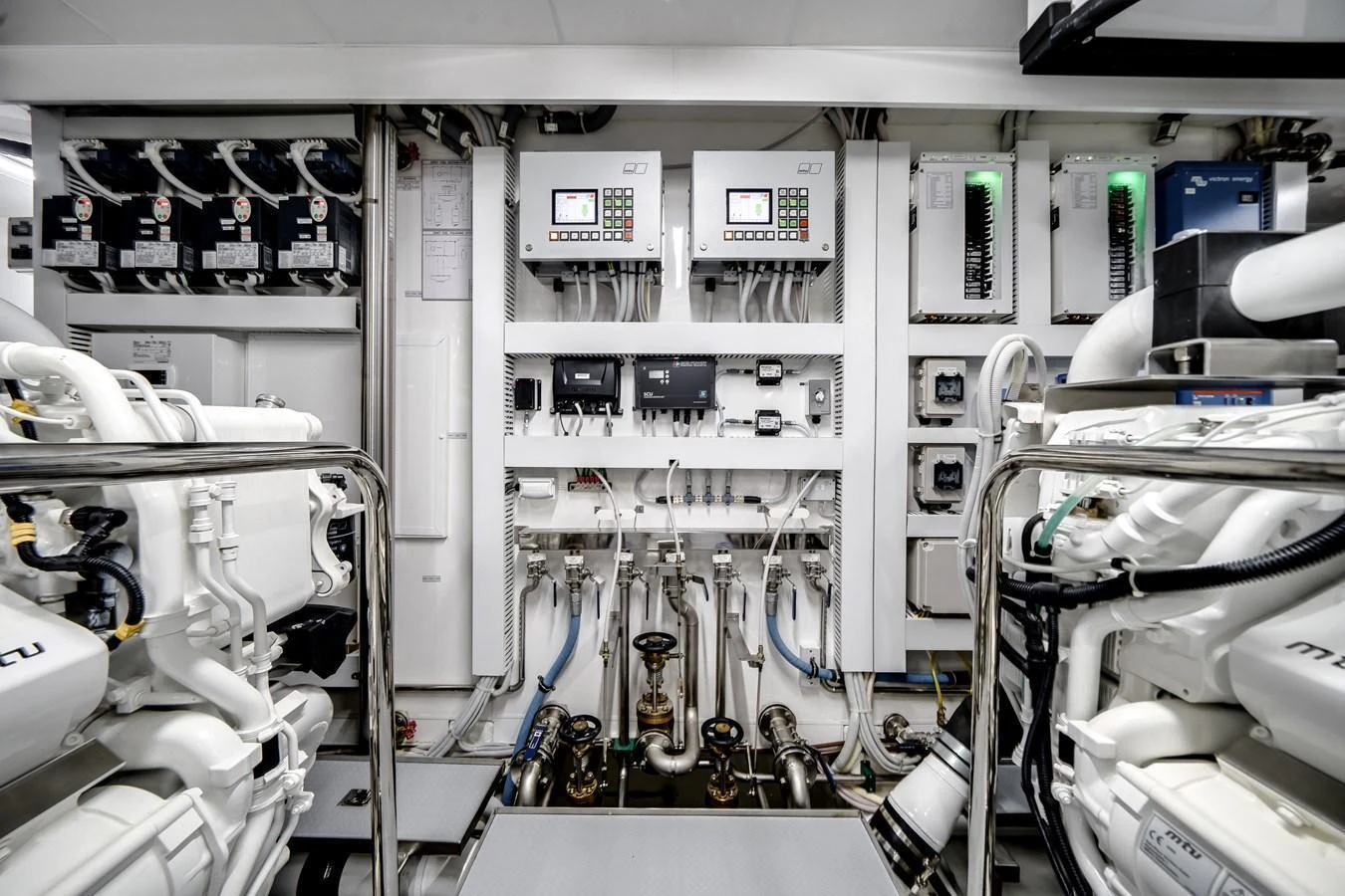 The engine room showcases advanced machinery and control systems, highlighting the yacht's technical sophistication. aboard OCEAN ALEXANDER 44G/01 Yacht for Sale
