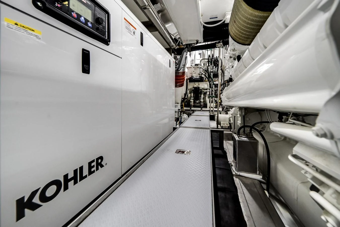 The engine room is equipped with advanced machinery and systems for optimal yacht performance. aboard OCEAN ALEXANDER 44G/01 Yacht for Sale