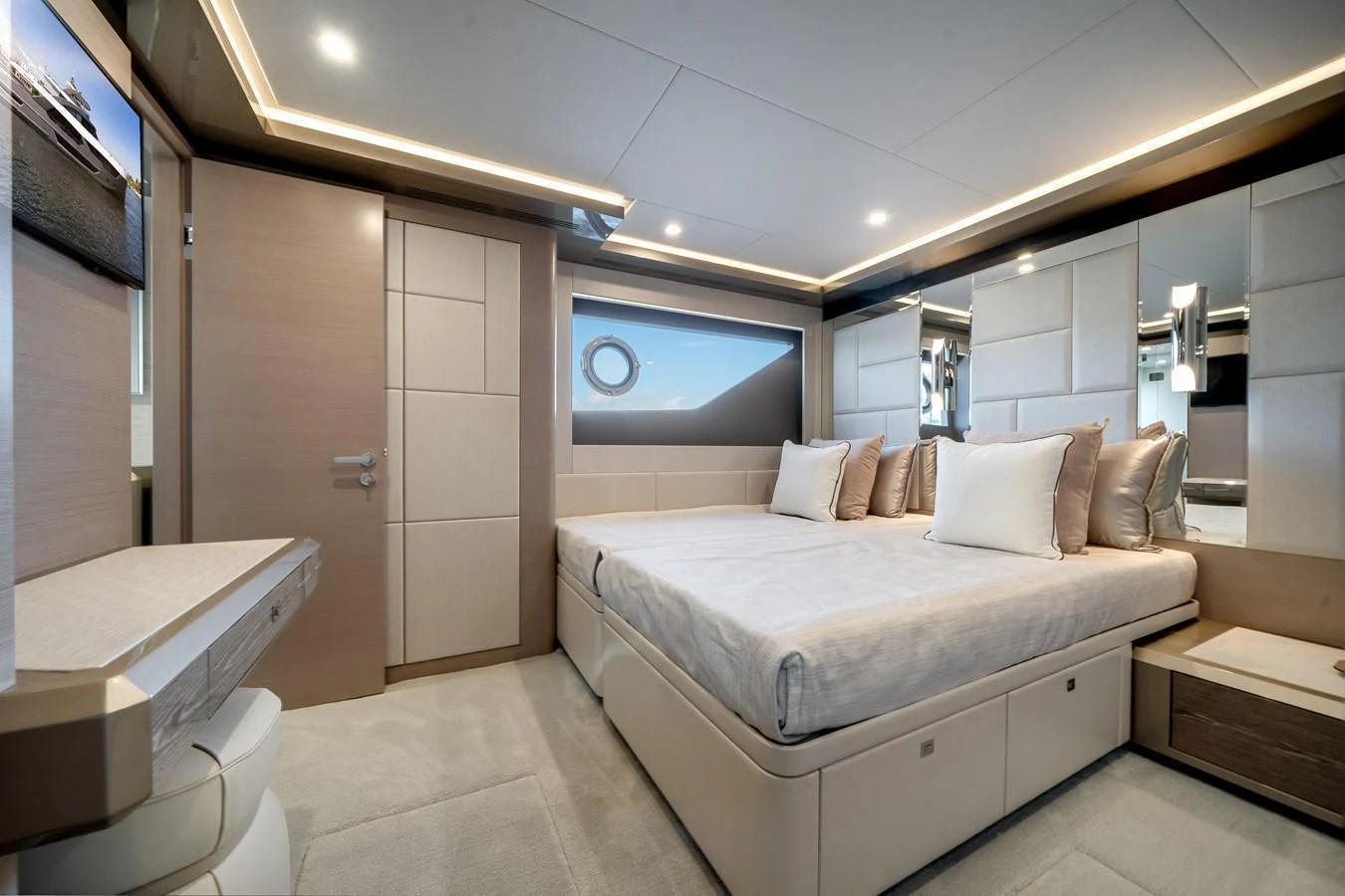 The stateroom features a luxurious bed with plush pillows and modern decor. aboard OCEAN ALEXANDER 44G/01 Yacht for Sale