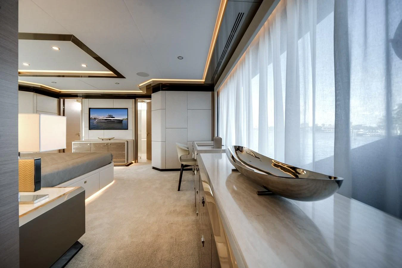 The master stateroom features elegant decor with ample natural light and luxurious furnishings. aboard OCEAN ALEXANDER 44G/01 Yacht for Sale