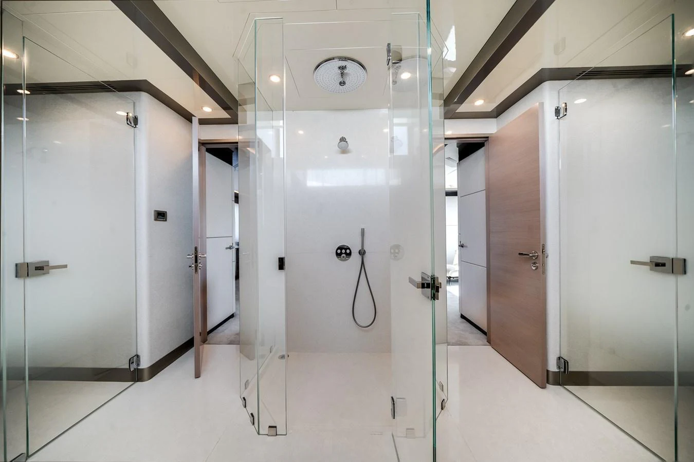 A sleek and modern bathroom with glass shower enclosures and minimalist design. aboard OCEAN ALEXANDER 44G/01 Yacht for Sale