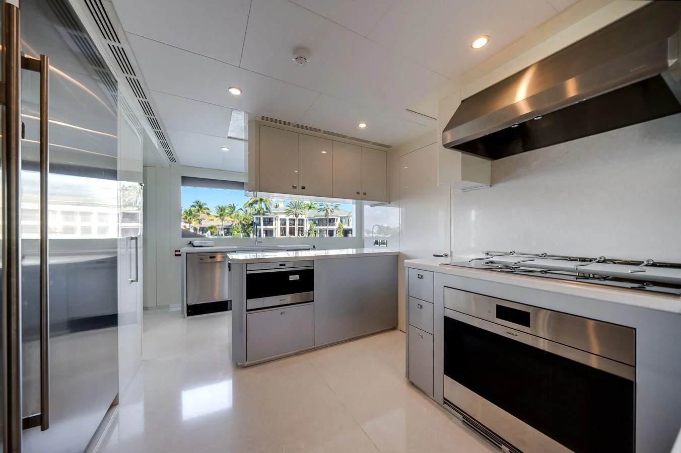 The yacht's galley is modern and spacious, featuring high-end appliances and ample counter space. aboard OCEAN ALEXANDER 44G/01 Yacht for Sale