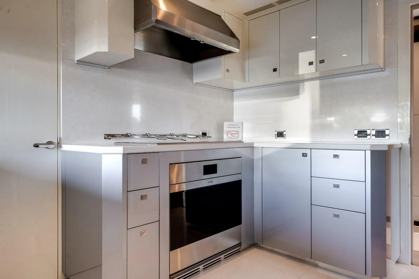 The yacht's galley features modern appliances and sleek cabinetry for a stylish and functional cooking space. aboard OCEAN ALEXANDER 44G/01 Yacht for Sale