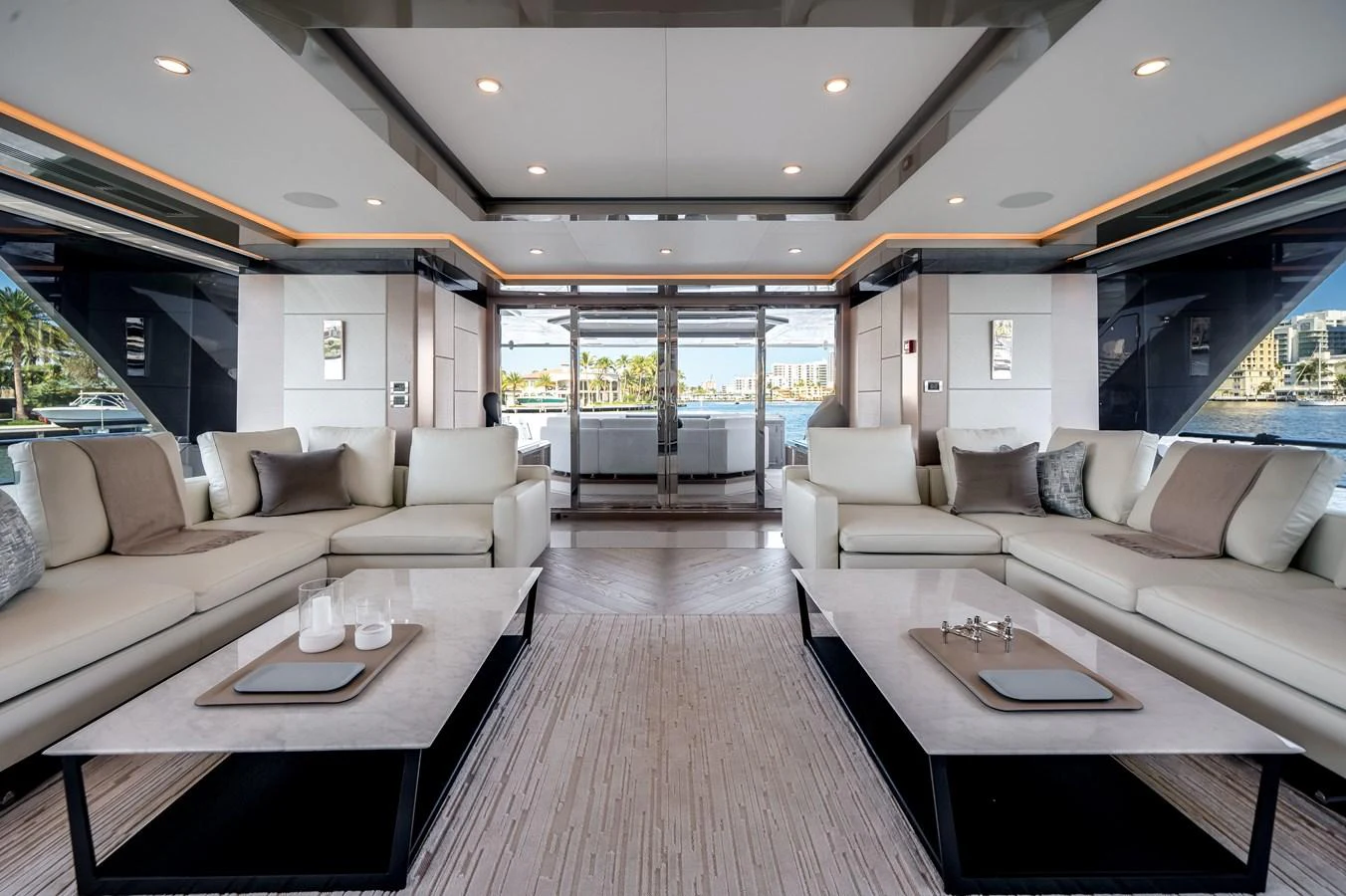 The spacious salon features elegant seating and modern decor with ample natural light. aboard OCEAN ALEXANDER 44G/01 Yacht for Sale