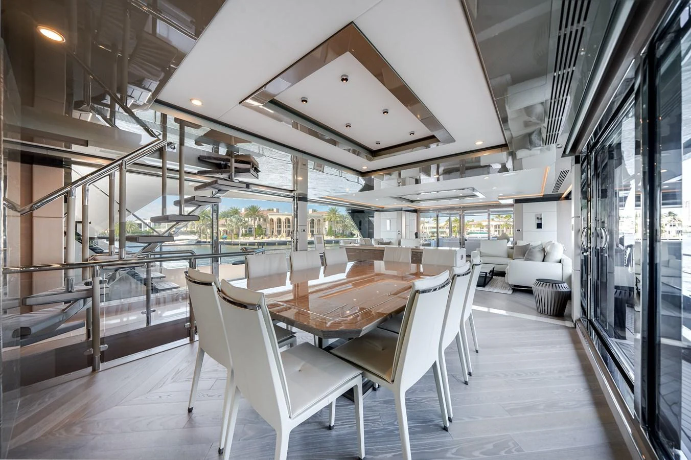 A luxurious dining area with modern furnishings and large windows offering scenic views. aboard OCEAN ALEXANDER 44G/01 Yacht for Sale