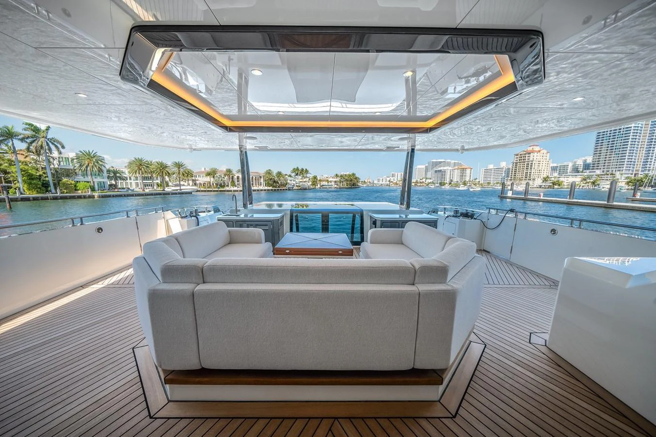 The aft deck offers a spacious and luxurious seating area with stunning waterfront views. aboard OCEAN ALEXANDER 44G/01 Yacht for Sale