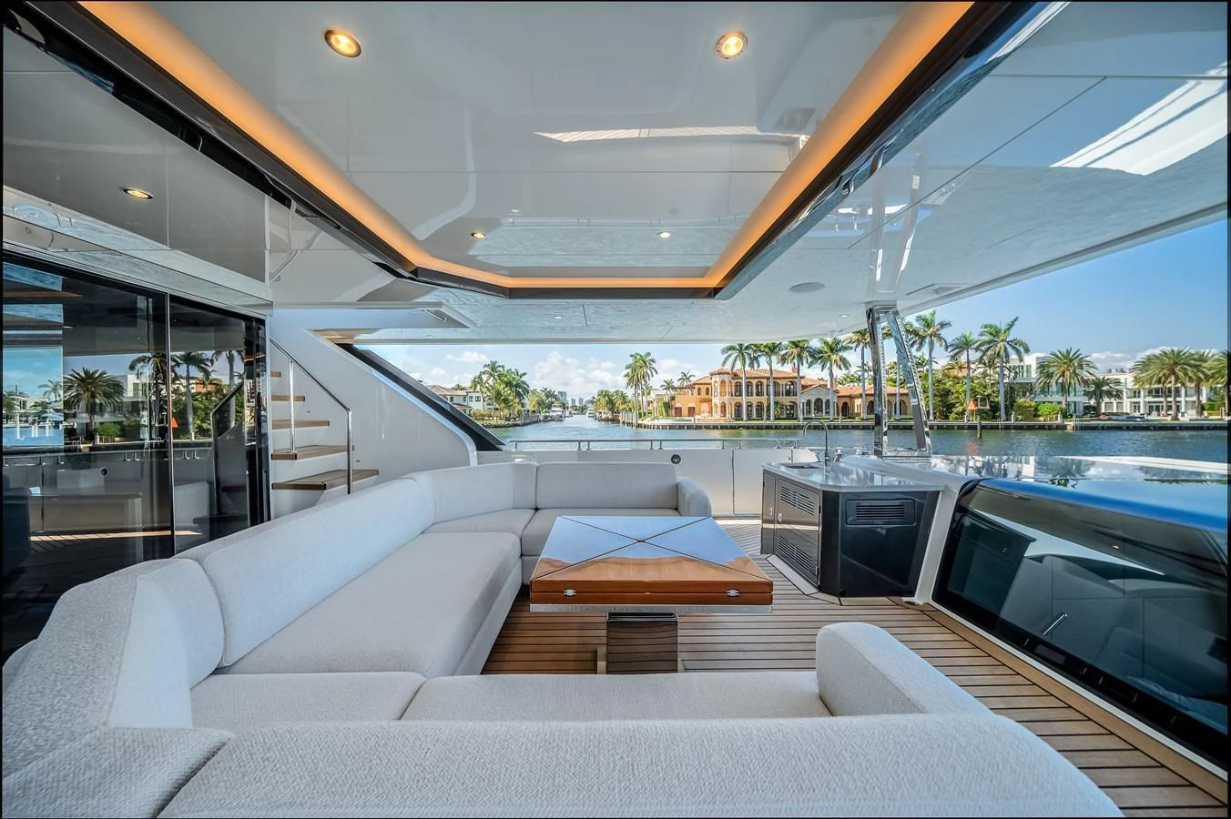 The aft deck features a spacious seating area with a modern design, perfect for relaxation and socializing. aboard OCEAN ALEXANDER 44G/01 Yacht for Sale