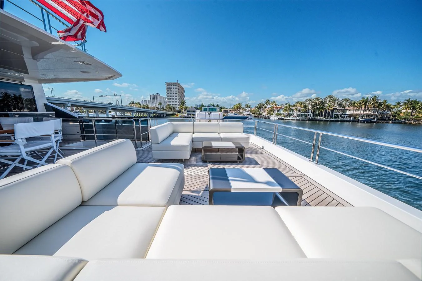The aft deck offers a spacious and luxurious outdoor seating area with stunning water views. aboard OCEAN ALEXANDER 44G/01 Yacht for Sale