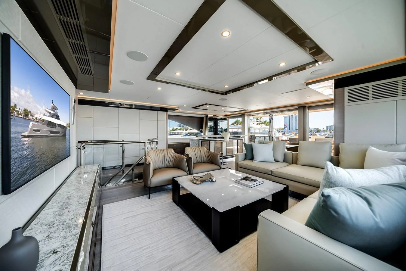 The yacht's salon offers a spacious and luxurious seating area with modern decor and ample natural light. aboard OCEAN ALEXANDER 44G/01 Yacht for Sale
