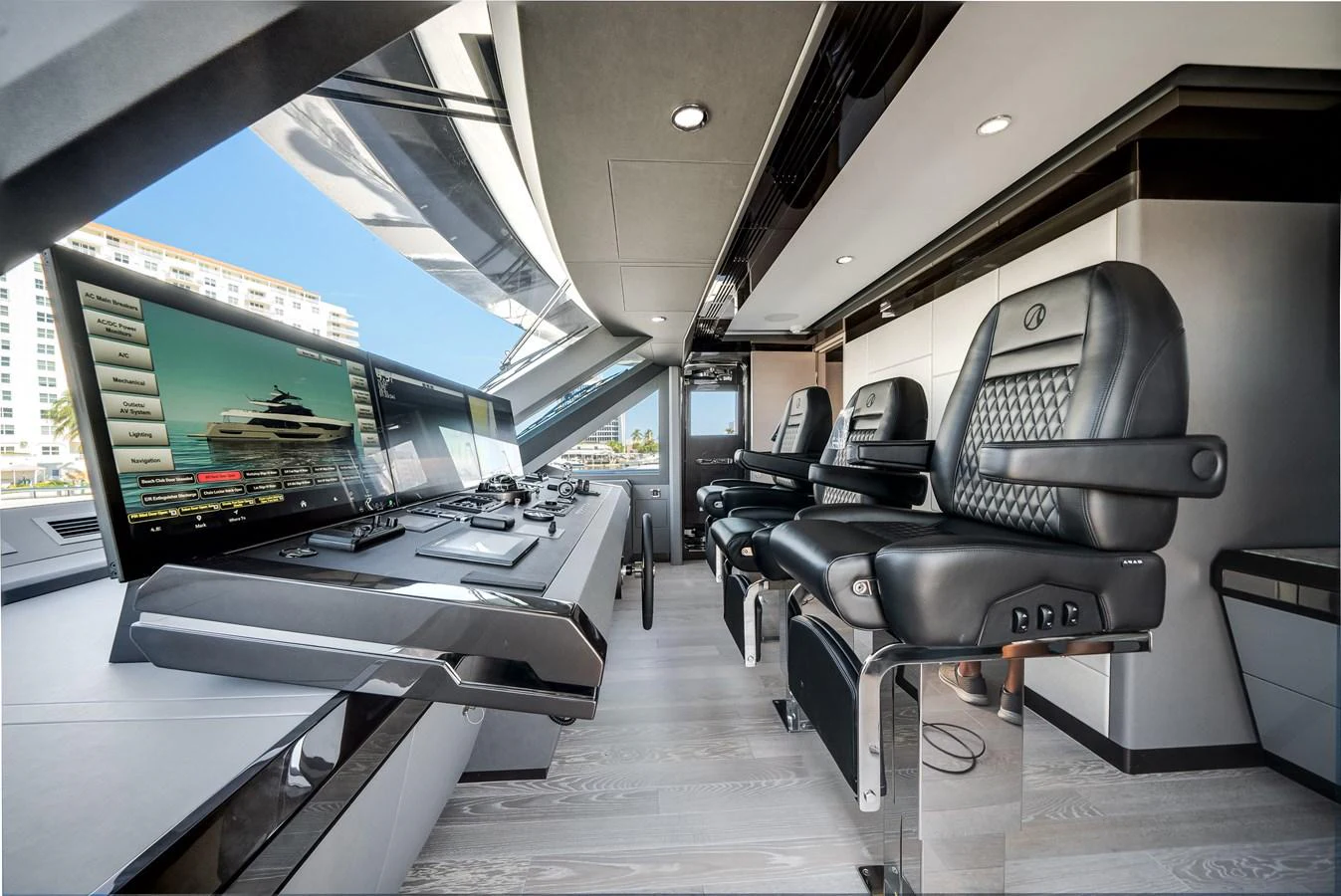 The helm station features advanced navigation equipment and luxurious seating for optimal comfort and control. aboard OCEAN ALEXANDER 44G/01 Yacht for Sale