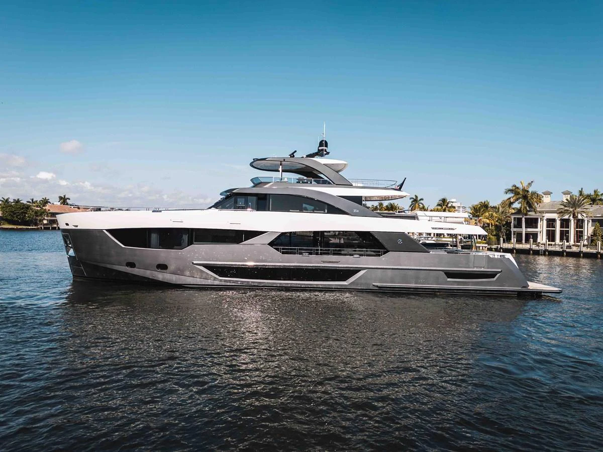A sleek and modern yacht cruising on calm waters under a clear blue sky. aboard OCEAN ALEXANDER 44G/01 Yacht for Sale