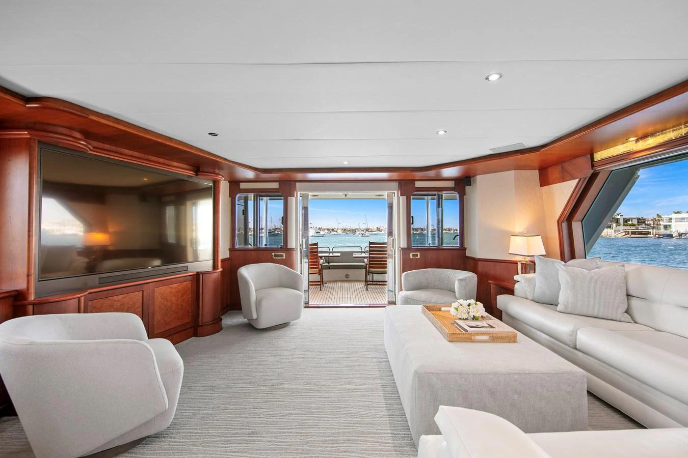 The yacht's salon offers a spacious and elegant living area with panoramic views. aboard GOLDEN BOY II Yacht for Sale