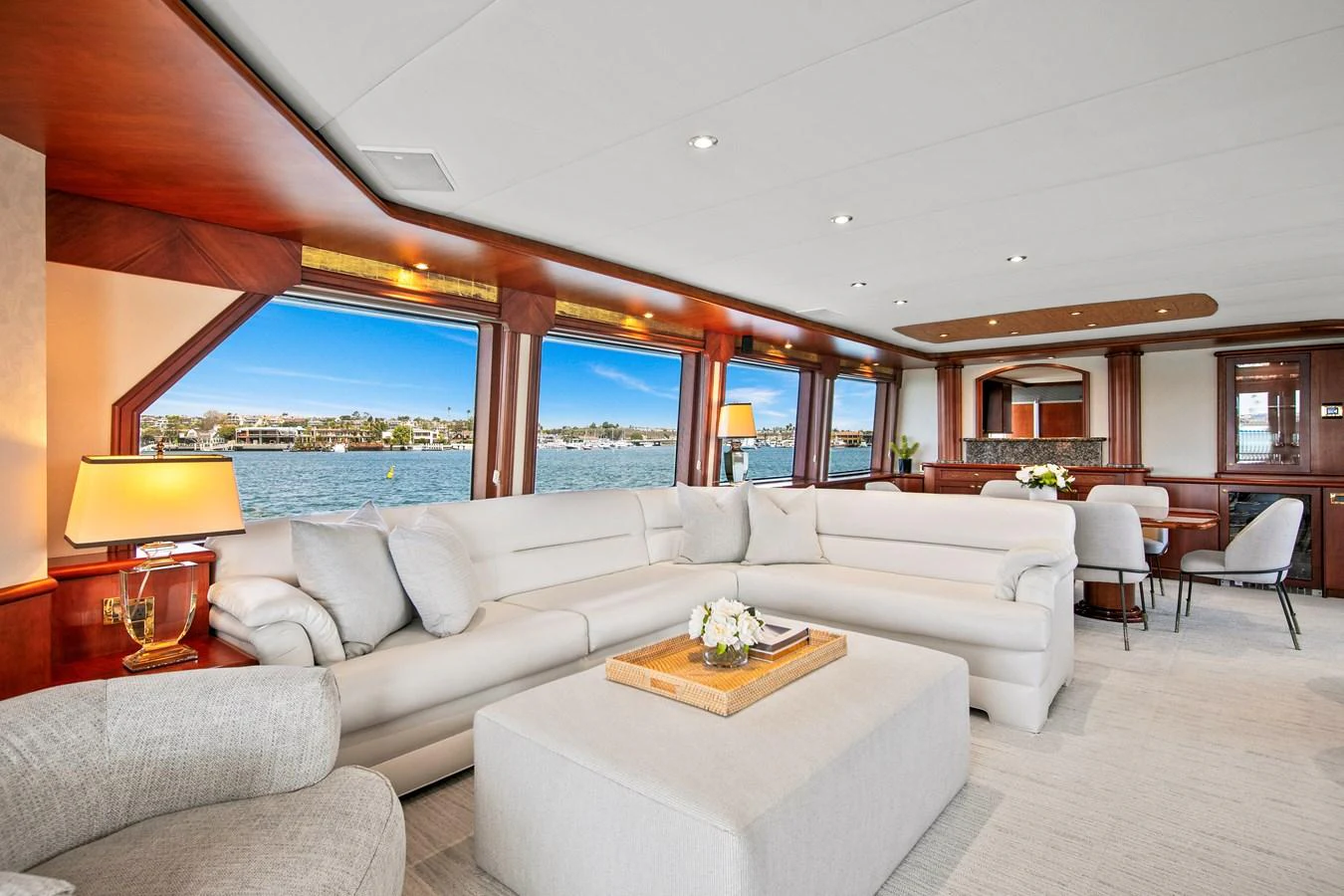 The salon features plush seating, large windows, and elegant decor, offering a luxurious and comfortable space to relax. aboard GOLDEN BOY II Yacht for Sale