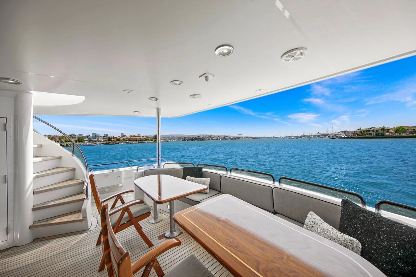 The aft deck offers a serene space with comfortable seating and stunning views of the water. aboard GOLDEN BOY II Yacht for Sale