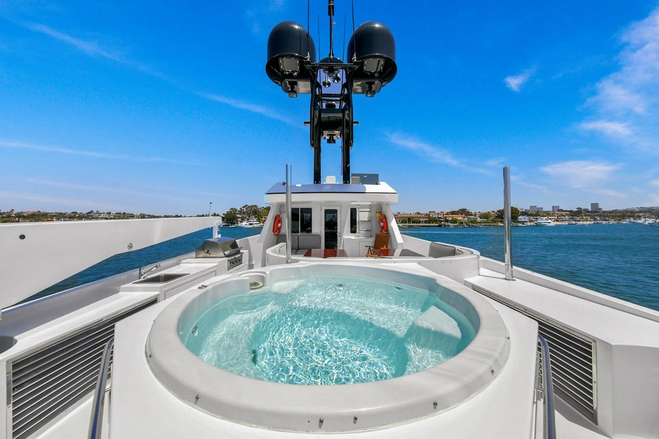 The sundeck features a luxurious jacuzzi with stunning views of the surrounding waters. aboard GOLDEN BOY II Yacht for Sale