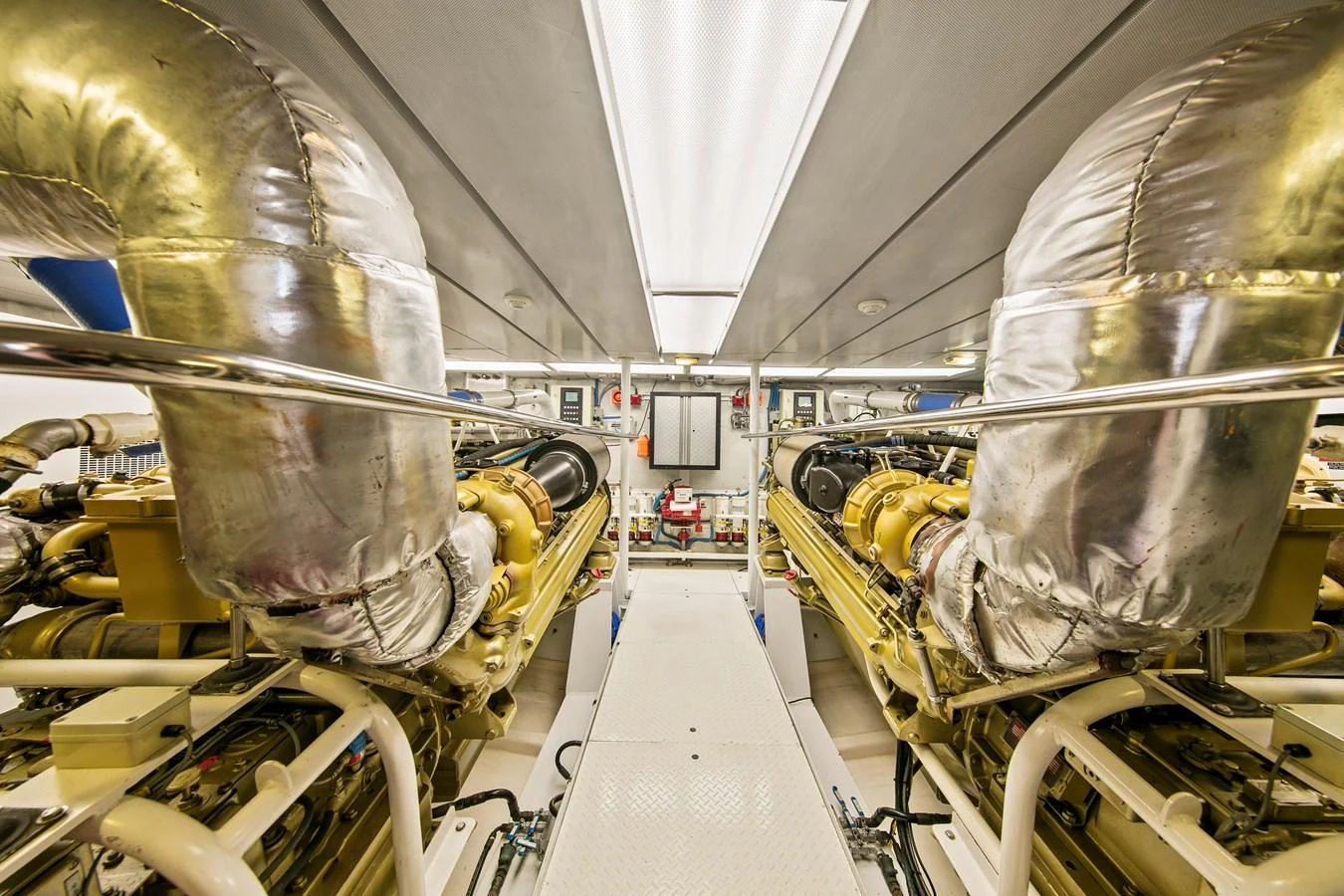 The engine room showcases powerful and well-maintained machinery, emphasizing the yacht's engineering excellence. aboard GOLDEN BOY II Yacht for Sale