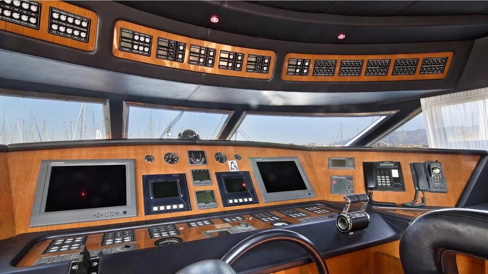 a control panel in a control room aboard ELVI Yacht for Sale