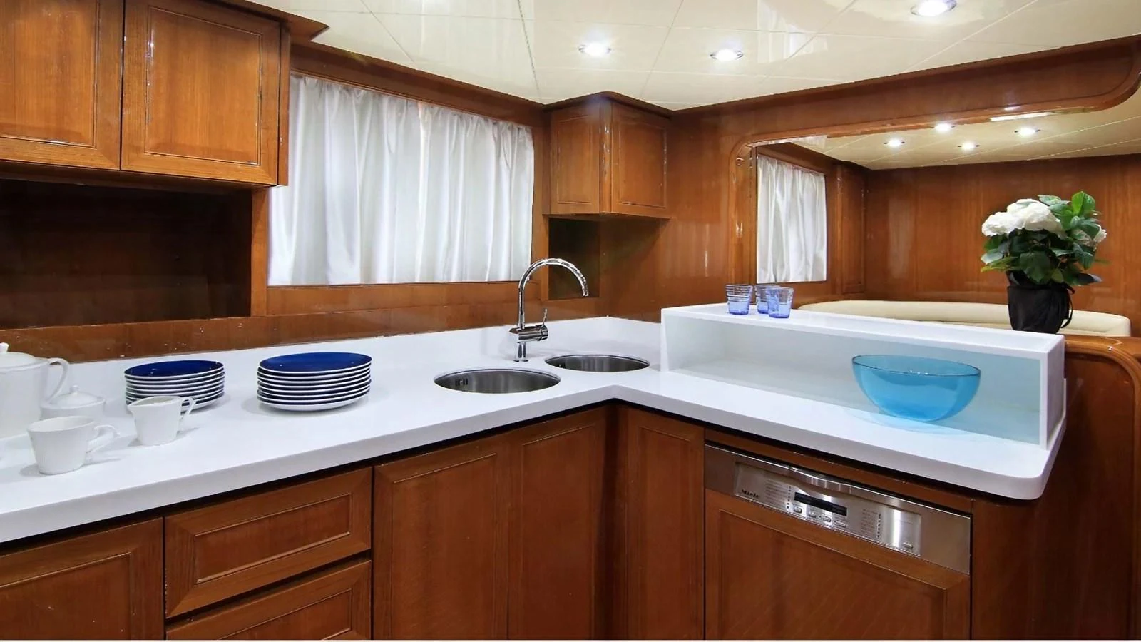 a kitchen with a sink and cabinets aboard ELVI Yacht for Sale