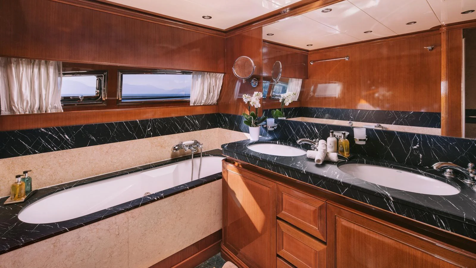 a bathroom with a large bathtub aboard ELVI Yacht for Sale