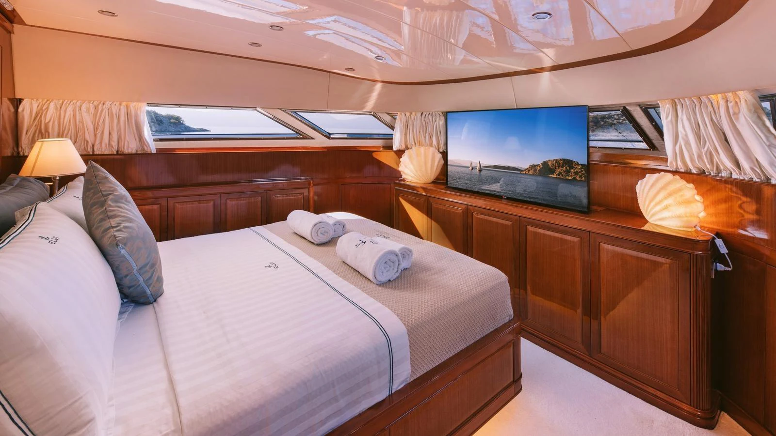 a room with two beds aboard ELVI Yacht for Sale