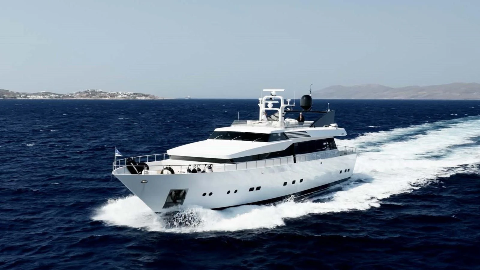 a white boat on the water aboard BELLINI Yacht for Sale