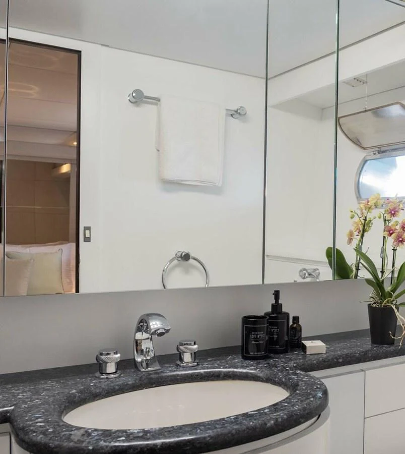 a bathroom with a large mirror aboard BELLINI Yacht for Sale