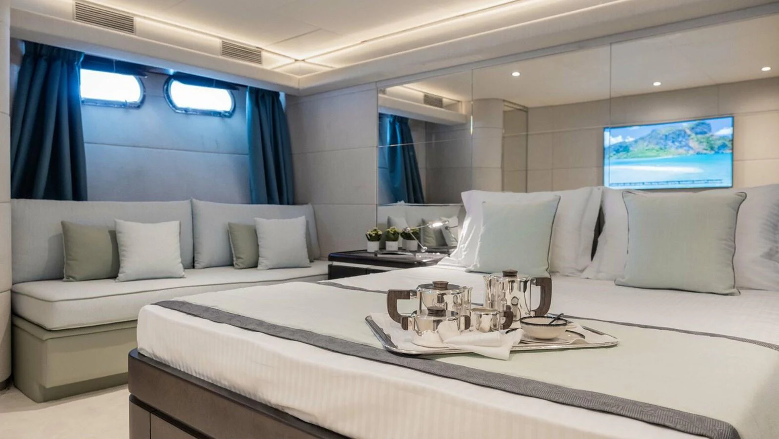 a bed with white pillows aboard BELLINI Yacht for Sale