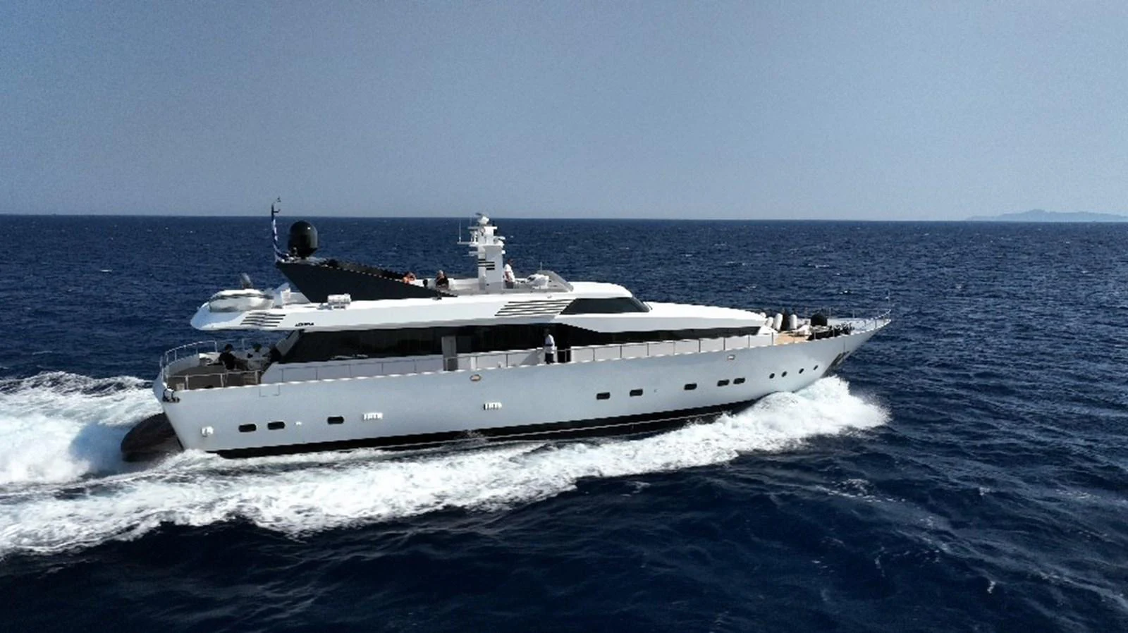a white yacht on the water aboard BELLINI Yacht for Sale