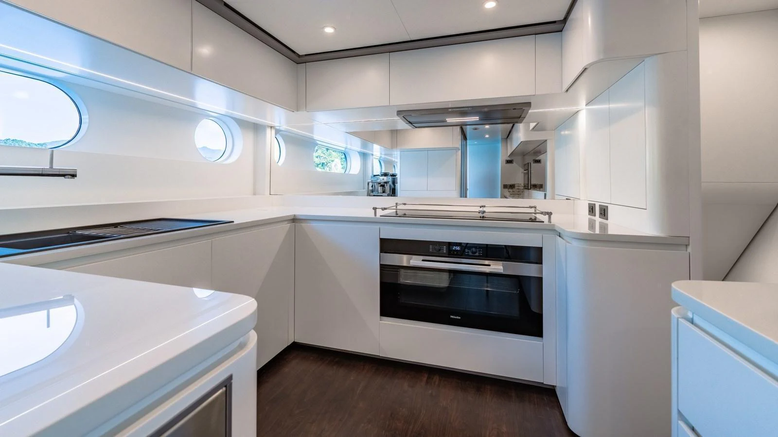 The yacht's galley is sleek and modern, featuring high-end appliances and ample counter space. aboard ARIA Yacht for Sale