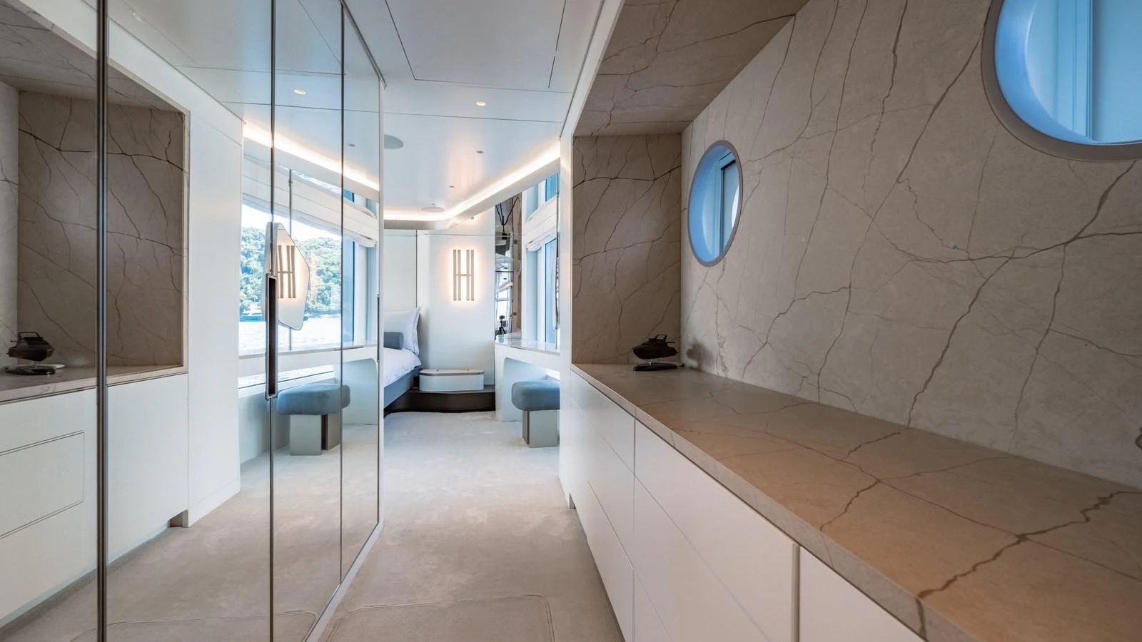This elegant stateroom features modern design with ample natural light and luxurious finishes. aboard ARIA Yacht for Sale