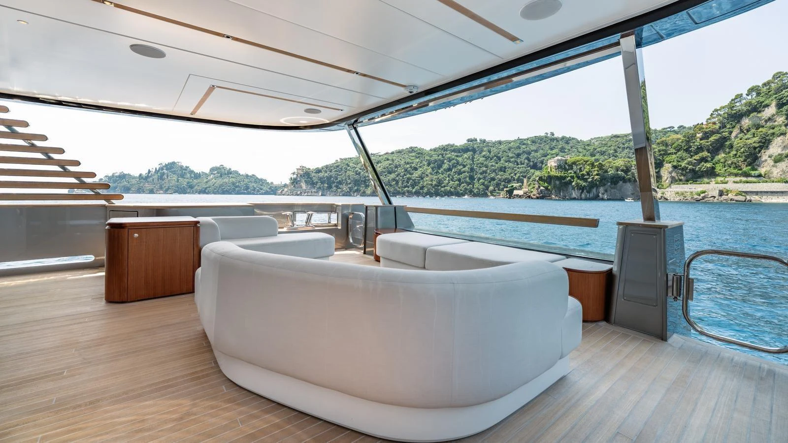 The aft deck offers a spacious and elegant seating area with stunning views of the surrounding water and landscape. aboard ARIA Yacht for Sale
