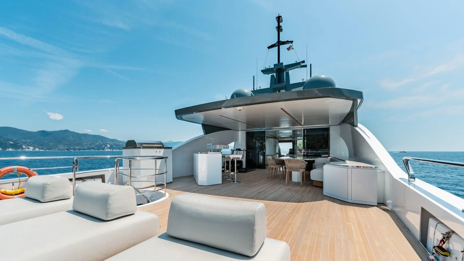 The sundeck offers a spacious and luxurious area for relaxation and entertainment with stunning sea views. aboard ARIA Yacht for Sale