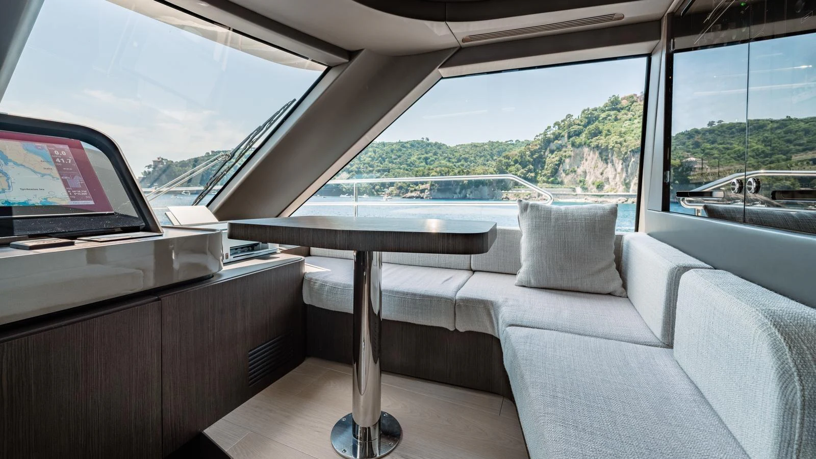 The salon offers a comfortable seating area with panoramic views of the surrounding waters. aboard ARIA Yacht for Sale