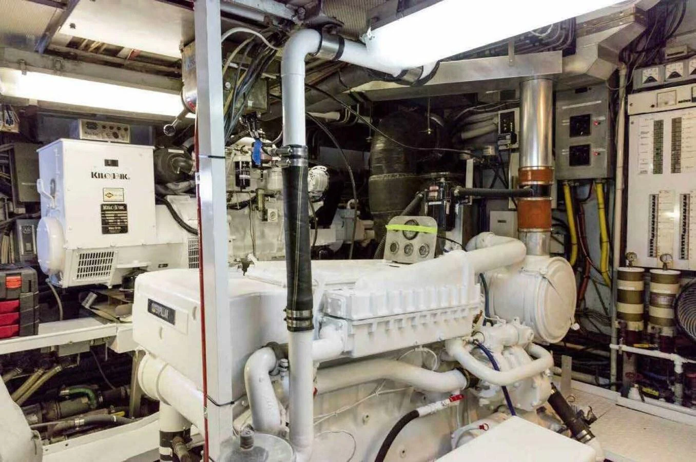 The image showcases the yacht's well-maintained engine room with advanced machinery. aboard SEAFARI Yacht for Sale